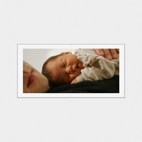 The hospital and first days, with a short note to your kid at the front if you want one.