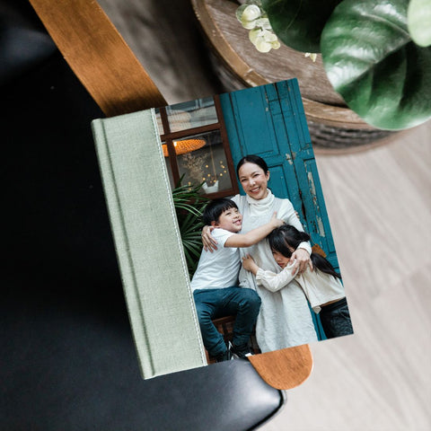 Heirloom photo album with on cover by Atte Design.